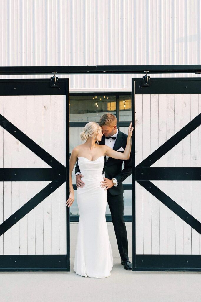 Bride and groom sharing a dance at The Pines, surrounded by their wedding guests.