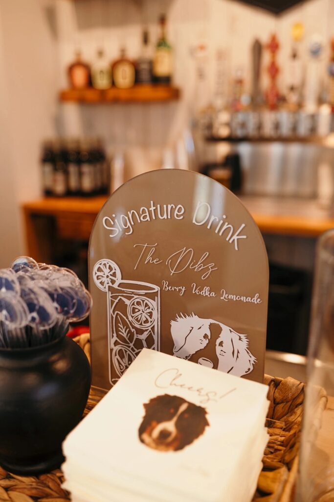 Custom bar menu at a wedding reception for the bride and groom names after their dogs - custom puppy cocktails.