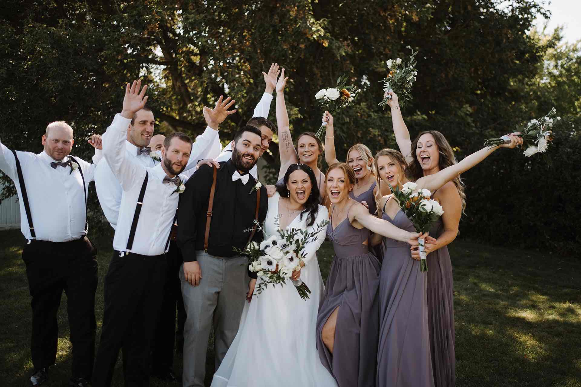 Wedding party group shot with happy expressions at The Pines.